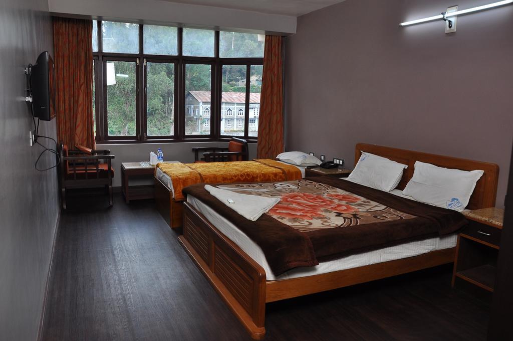 Grand Paradise Inn Kodaikanal Szoba fotó