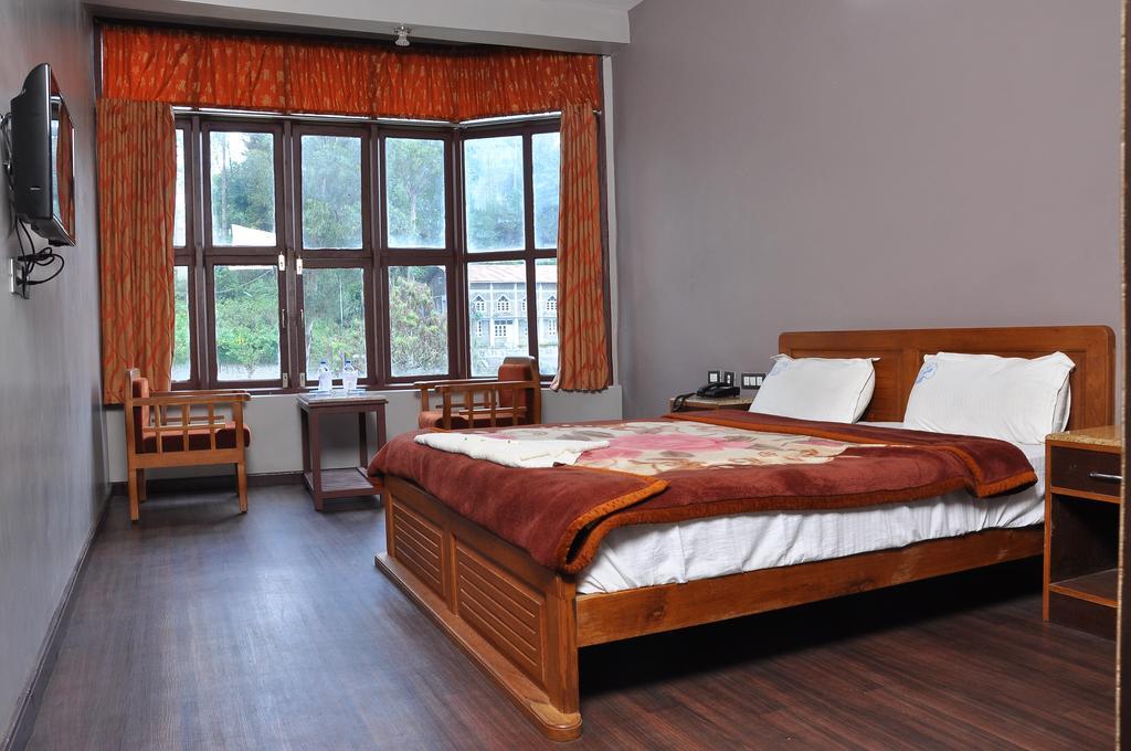 Grand Paradise Inn Kodaikanal Szoba fotó