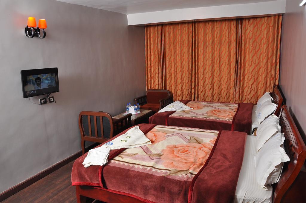 Grand Paradise Inn Kodaikanal Szoba fotó