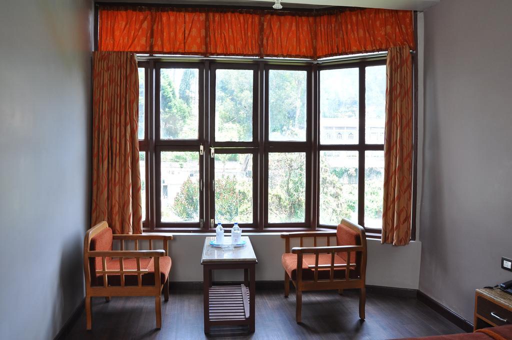 Grand Paradise Inn Kodaikanal Szoba fotó